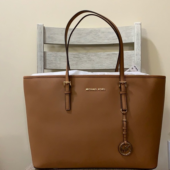 Michael Kors Handbags - Brand new Michael Kors Jet Set Travel bag.